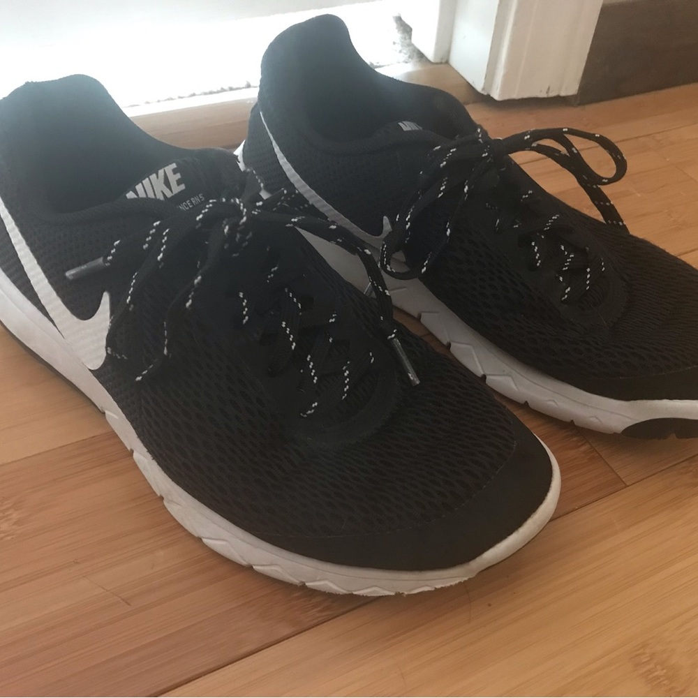 Women’s Black Nike running shoes. Size 7.